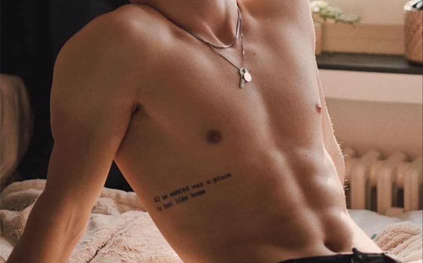 attractive simple small rib tattoos for guys
