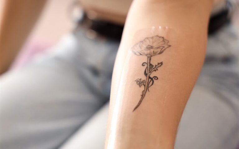 flower arm tattoos for females