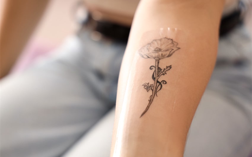 flower arm tattoos for females