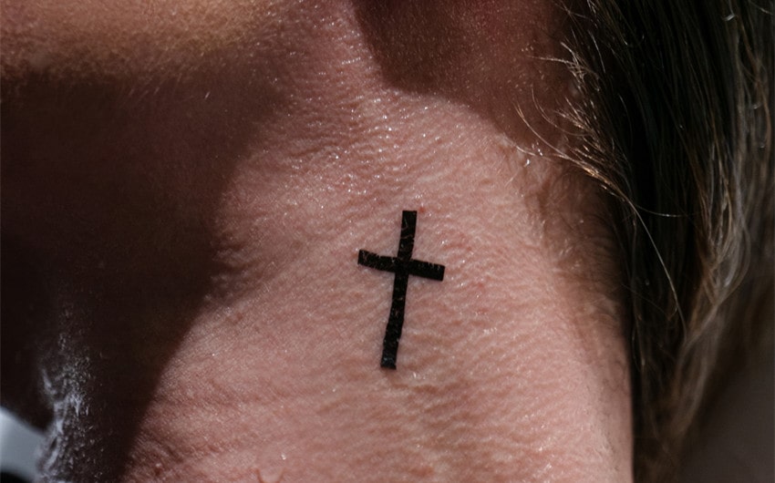 women's feminine cross tattoo